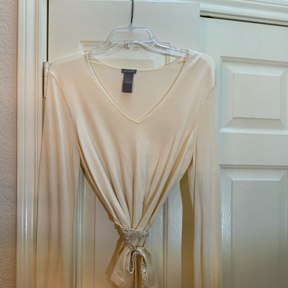 This dressy cream sweater with a little bling is such a dream!